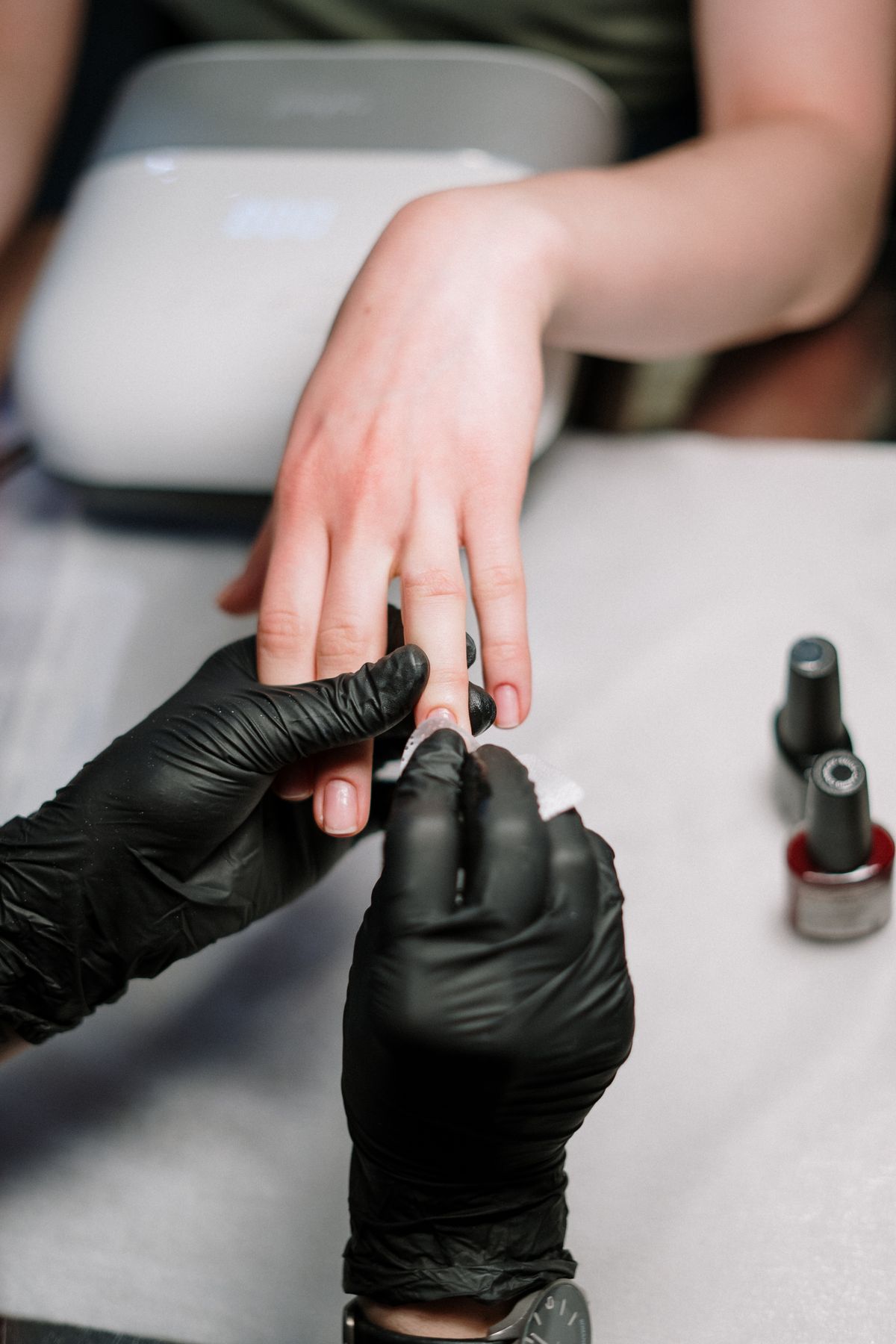 Manicure in progress at Ombré Nail Bar